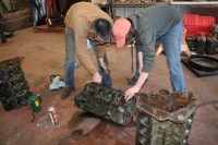 The boys working on the motor